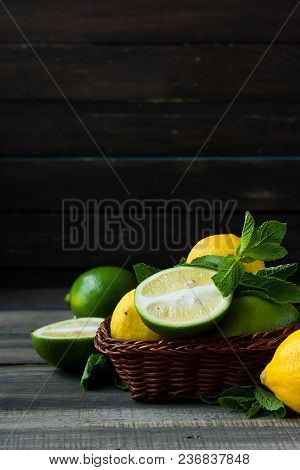 Fresh Citrus And Mint In A Wooden Basket