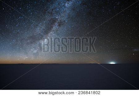 Night starry sky over the salt flat of Salar de Uyuni, Altiplano, Bolivia