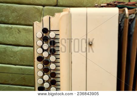 Close-up Of Old Russian Traditional Musical Instrument Bayan