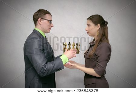 The Businessman Holds The Gold Crown As Symbol Of Power And Giving It To His Receiver. Change Of Pow