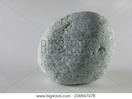 Wild Pebble Stone Isolated On White Background. Jadeite Stone.