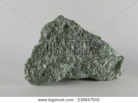 Close-up Raw Jade Mineral Stone, Isolated On White Background