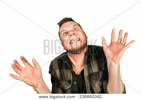Young Smiling Guy With Beard And Modern Hairstyle Isolated On Background.