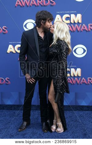 LAS VEGAS-APR 15: Singer Chris Janson and wife Kelly Lynn attend the 53rd Annual Academy of Country Music Awards on April 15, 2018 at the MGM Grand Arena in Las Vegas, Nevada.