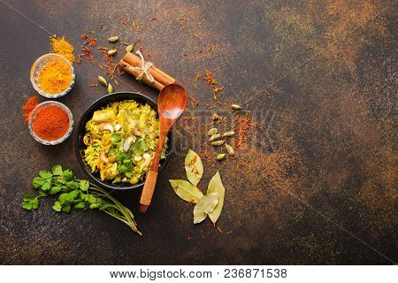 Biryani Rice, Traditional Indian Dish. Biryani Spicy Rice, Chicken, Nuts. Indian Rice Bowl, Spices, 