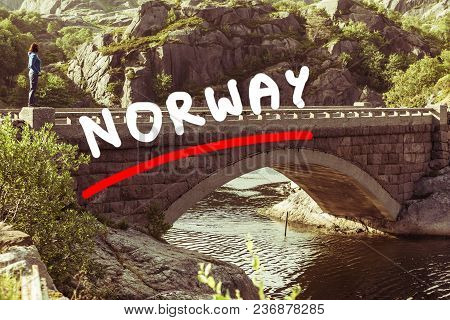 Female Tourist On Stone Old Bridge Vagand In Norway Sokndal Region