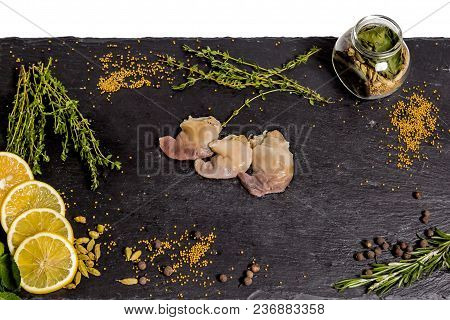 Spisula Sachalinensis Lie On A Black Dish