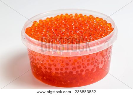 Red Caviar Salmon In A Jar On A White Background