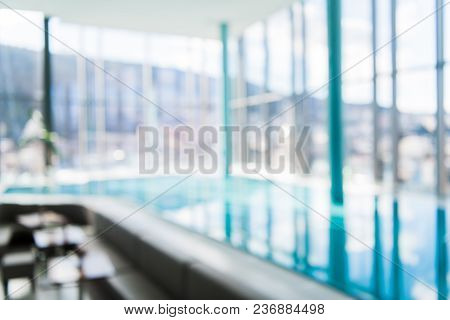 Abstract Blur Luxury Indoor Swimming Pool Background.