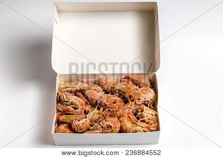 Shrimp Langoustine Lie On A White Background