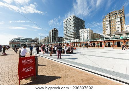 Brighton, United Kingdom - August 1, 2017: People Watching The Performance Of A Puppet Theater On Th