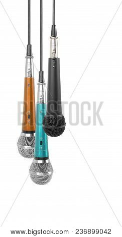 Music And Sound - Three Vocal Microphone Hang Down Isolated On A White Background.