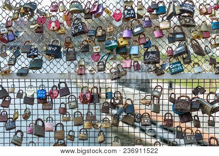 Poland Bydgoszcz April 2018. Many Hanging Padlocks On The Bridge. Concept Love Forever - Valentine.