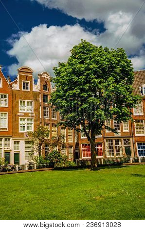 Semidetached Houses And Garden At Begijnhof, A Medieval Semi-monastic Community In Amsterdam. Famous