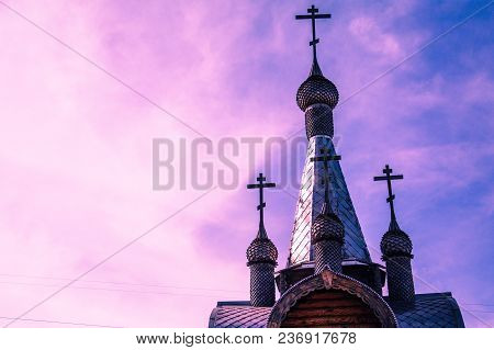 Silver Domes Of The Church Against The Sky With Clouds.