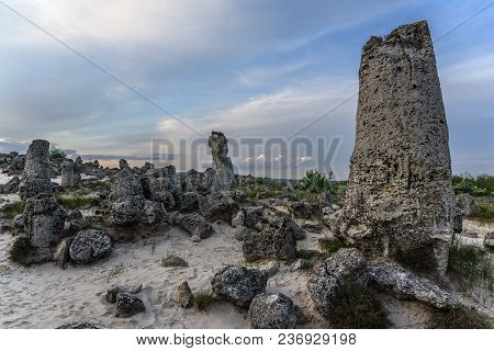 Magnificent Landscape Of Abstract Stones On A Hill At Sunset.