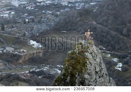 Beautiful Old Cross In Mountain Burial. The Mountainous Landscape Of The North Caucasus