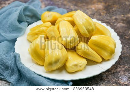 Fresh Jackfruit Slices On A White Plate. Sweet Yellow Jackfruit Ripe. Vegetarian, Vegan, Raw Food. E