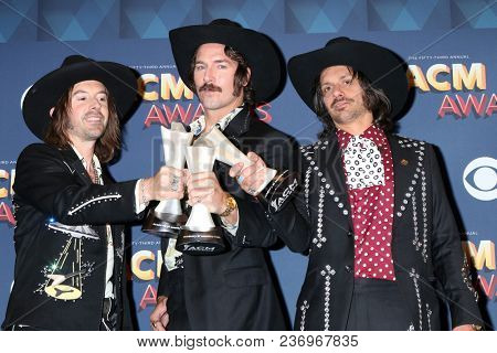 LAS VEGAS - APR 15:  Jess Carson, Mark Wystrach, Cameron Duddy at the Academy of Country Music Awards 2018 at MGM Grand Garden Arena on April 15, 2018 in Las Vegas, NV