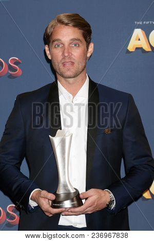 LAS VEGAS - APR 15:  Brett Young at the Academy of Country Music Awards 2018 at MGM Grand Garden Arena on April 15, 2018 in Las Vegas, NV