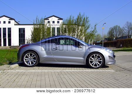 Almere, Flevoland, The Netherlands - March 17, 2018: Grey Peugeot Rcz Coupe Parked On Parked On A Pu
