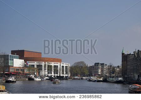 Amsterdam, Holland - 14 April 2018 Outdoor View Of Dutch National Opera Ballet. The Stopera Is Build