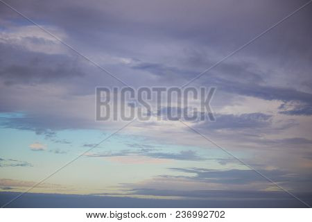 Beautiful Sunrise Clouds Over The Ocean At Paarden Eiland Beach.