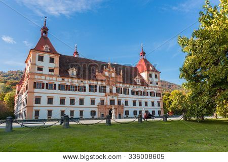 Graz, Austria - October 14, 2019:  Eggenberg Palace And Colorful Autumn Colors In The Park