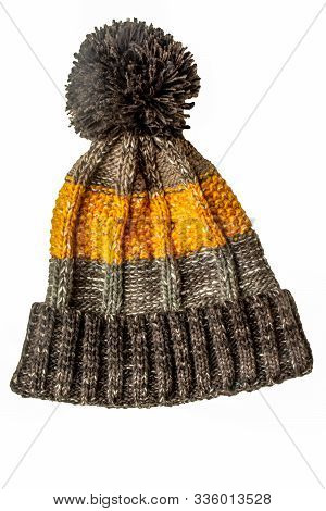 A Warm, Colorful, Winter Bobble Hat Isolated On A White Background