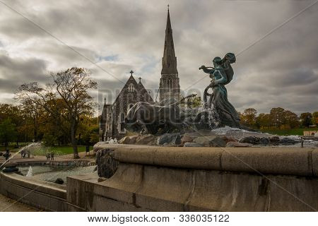 Copenhagen, Denmark: St. Alban's Church. Gefion Fountain In Gefjun Turned Her Four Sons Into Oxen