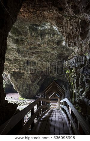A Wooden Bridge At The Entrance Of Smoo Cave, A Large Combined Sea Cave And Freshwater Cave In Durne