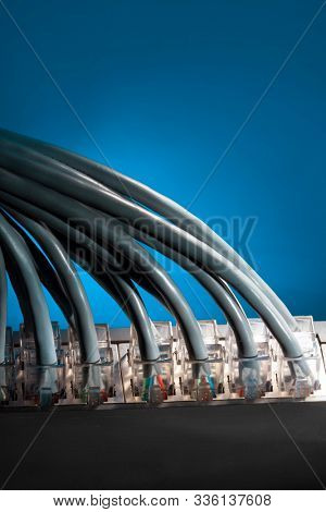 network hub with a lot of connected wires