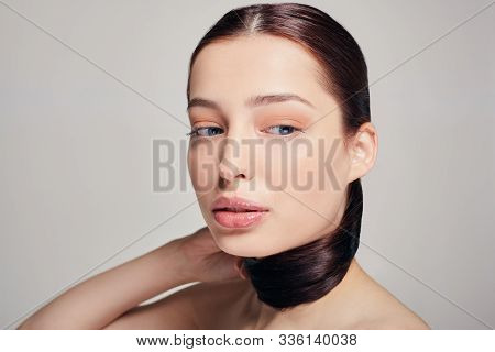 Cosmetology, Spa. Young Beautiful Pritty Girl With Blue Eyes And Full Lips Holds On Her Hand Her Hai