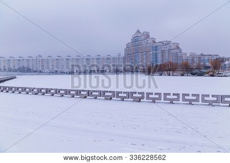Minsk, Belarus - November 26, 2019: NemigaTrinity Suburb. City landscape. Svislach river bank in the city center