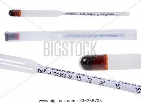 Glass Alcoholometer For Determining The Amount Of Alcohol In A Liquid On White Background.(with Clip