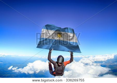 Argentina Extreme. Flag In Skydiving. People In Free Fall Grab Flag Of East Timor. Patriotism, Men A