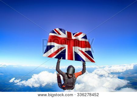 Great Britain Extreme. Flag In Skydiving. People In Free Fall Grab Flag Of Great Britain. Patriotism