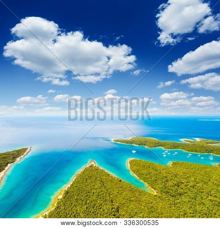 Aerial drone photo of tropical coast. Location place Punta Kriza, Cres island, Kvarner bay, Croatia, Europe. Great shot over the sea. Drone photography of popular tourist attraction. Beauty of earth.