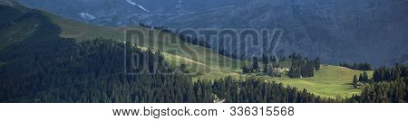 Alpine Scenery With Forest Ridge In Summer
