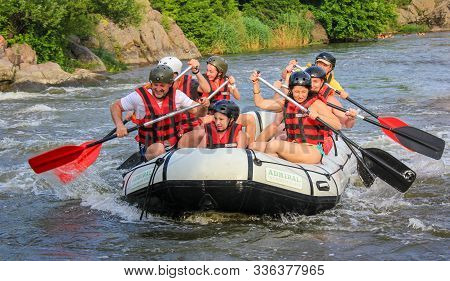 Mygiya / Ukraine - June 26 2018: Young Person Rafting On The River, Extreme And Fun Sport At Tourist
