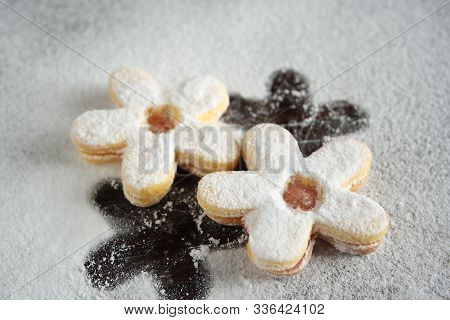 Homemade shortbread cookies with powdered sugar on the table