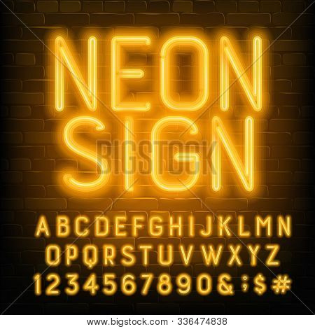 Neon Sign Alphabet Font. Yellow Neon Letters And Numbers. Brick Wall Background. Stock Vector Typesc