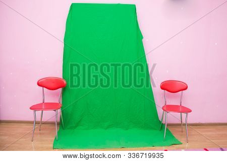 Big Green Background For Added Special Effects In Post Production.green Screen. The Chroma Key. Gree