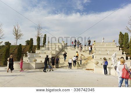 Moldavian, Crimea, Russia-05 October 2019: People On A Beautifully Decorated White Staircase With Ca