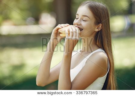 Cute And Stylish Girl With A Humburger