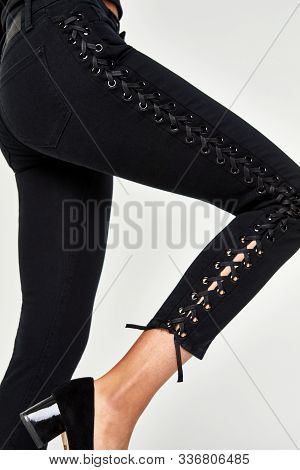 Blue Casual Denim For Women’s With Design Of Edges Paired With Black Footwear And White Background,