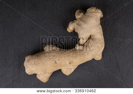 One Whole Fresh Brown Ginger Flatlay On Grey Stone
