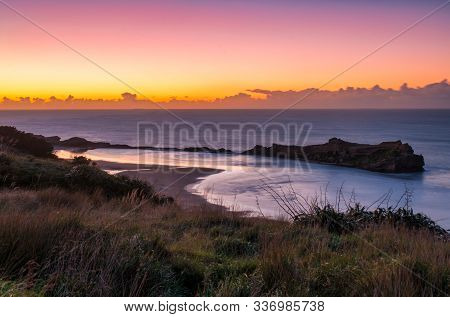 Beautiful Colours In The Sky At Sunrise Overlooking The Castlepoint Reef And Lagoon  Walking Up To C