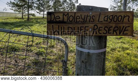 Marian, Queensland, Australia - October 2021: Timber Sign For De Moleyns Lagoon Wildlife Reserve On 