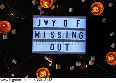 Lightbox With Text Jomo Joy Of Missing Out. The Concept Of Relaxation From Information And Gadgets. 